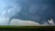 A supercell thunderstorm produces two tornadoes at once in a farm field south of Dodge City, Kansas A supercell thunderstorm produces two tornadoes at once in a farm field south of Dodge City, Kansas
