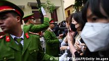 Vietnamese policemen set up a barricade as journalists gather outside the North Korean embassy in Hanoi on February 26, 2019, ahead of the second US-North Korean summit. - North Korean leader Kim Jong Un arrived in Hanoi to throngs of cheering, flag-waving crowds on February 26, on the eve of a second summit with US President Donald Trump the world is closely watching for tangible progress over North Korea's nuclear programme. (Photo by Ye Aung THU / AFP) (Photo credit should read YE AUNG THU/AFP via Getty Images)