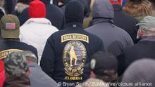 January 6, 2021, Washington, D.C, USA: A member of the Oath Keepers looks on as supporters of Donald Trump attend a rally protesting the 2020 election results in Washington, DC., on January 7, 2021. (Credit Image: Â© Bryan Smith/ZUMA Wire