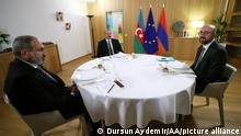 BRUSSELS, BELGIUM - DECEMBER 14: President of Azerbaijan Ilham Aliyev and Prime Minister of Armenia Nikol Pashinyan meet with President of the European Council Charles Michel at a trilateral meeting ahead of the Eastern Partnership summit in Brussels, Belgium on December 14, 2021. Dursun Aydemir / Anadolu Agency