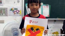 
Name: Taiwanese kid present her drawing about Radioactive waste.
Time: December 2021
Place: Lanyu (Orchid Island), Taiwan Keyword: Lanyu, Orchid island, Tao, Taiwan, indigenous tribes, Pongso no Tao, radioactive nuclear waste, nuclear waste, Radioactive waste
Copyright: DW Chinese/Zachary Lee