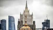 This photograph shows the Russian Foreign Ministry building and Moscow's International Business Centre (Moskva City) behind the dome of a church in central Moscow on June 29, 2021. (Photo by Alexander NEMENOV / AFP) (Photo by ALEXANDER NEMENOV/AFP via Getty Images)