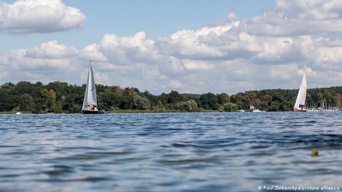 Clouds over a lake with sailing boats, Wannsee Lake, Berlin, Germany