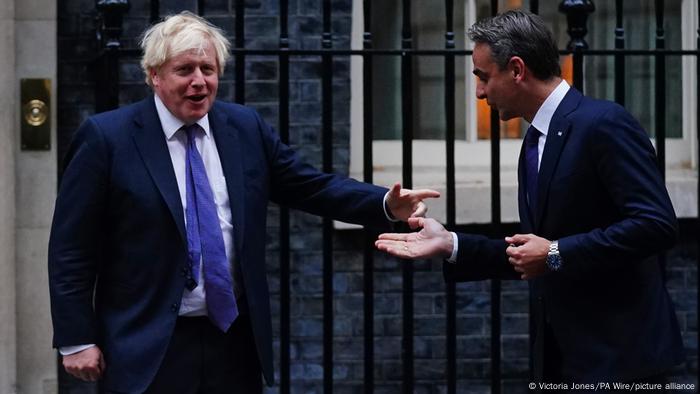 Boris Johnson points his finger at Greek Prime Minister Kyriakos Mitsotakis