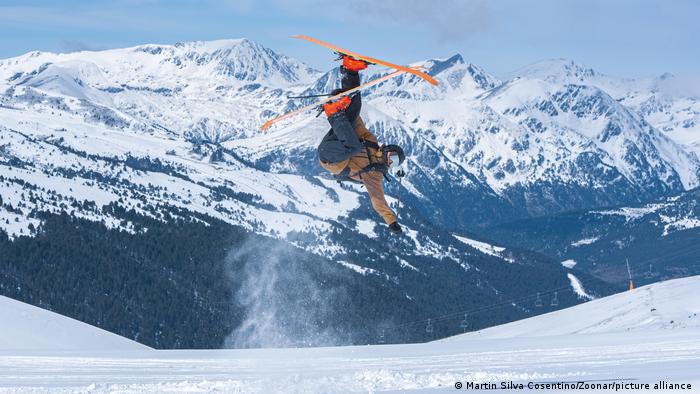 A skier doing a mid-air spin at Grandvalira, Andorra