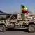  A military vehicle with the Ethiopian national flag