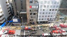 An aerial picture shows a fire site in Osaka City, Osaka Prefecture on Dec. 17, 2021. An about 20-square-meter clinic on the fourth floor was burnt. According to City Fire Station, 27 people are in cardiopulmonary arrest. ( The Yomiuri Shimbun via AP Images )