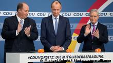 From left, candidate Helge Braun, new elected party chairman Friedrich Merz and candidate Norbert Roettgen, attend a press conference of the German Christian Democratic Party (CDU) at the party's headquarters in Berlin, Germany, Friday, Dec. 17, 2021 to announce the results of a ballot on who will become its new leader. (AP Photo/Michael Sohn)