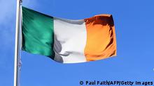 An Irish national flag (L) flies alongside a European Union (EU) flag in the centre of Dublin, Ireland on October 9, 2018. (Photo by Paul FAITH / AFP) (Photo credit should read PAUL FAITH/AFP via Getty Images)
