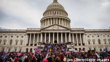 06.01.2021
WASHINGTON, DC - JANUARY 06: A large group of pro-Trump protesters stand on the East steps of the Capitol Building after storming its grounds on January 6, 2021 in Washington, DC. A pro-Trump mob stormed the Capitol, breaking windows and clashing with police officers. Trump supporters gathered in the nation's capital today to protest the ratification of President-elect Joe Biden's Electoral College victory over President Trump in the 2020 election. (Photo by Jon Cherry/Getty Images)