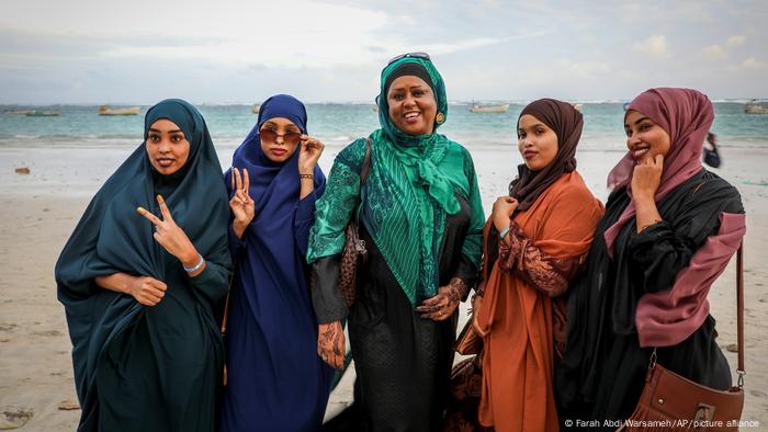 Somali Parliament member Fawzia Yusuf H. Adam chats with campaign supporters at a beach in Mogadishu