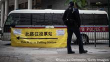 19.12.2021
HONG KONG, CHINA - DECEMBER 19: A police officer stands guard outside a polling station on December 19, 2021 in Hong Kong, China. Hong Kong is set to hold its Legislative Council election on December 19, the first citywide poll since Beijing revamped the electoral system to ensure only patriots hold political power, the South China Morning Post reported. (Photo by Louise Delmotte/Getty Images)