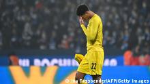 Dortmund's English midfielder Jude Bellingham reacts after the German first division Bundesliga football match between VfL Bochum and Borussia Dortmund in Bochum, western Germany on December 11, 2021. - DFL REGULATIONS PROHIBIT ANY USE OF PHOTOGRAPHS AS IMAGE SEQUENCES AND/OR QUASI-VIDEO (Photo by Ina Fassbender / AFP) / DFL REGULATIONS PROHIBIT ANY USE OF PHOTOGRAPHS AS IMAGE SEQUENCES AND/OR QUASI-VIDEO (Photo by INA FASSBENDER/AFP via Getty Images)