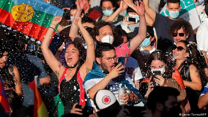 Supporters of Chilean president-elect Gabriel Boric celebrate following the official results