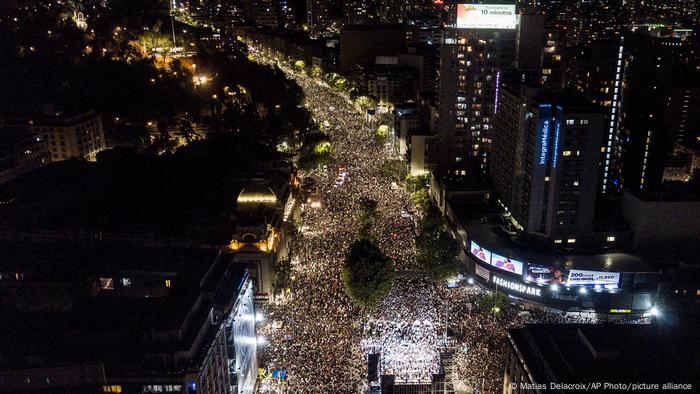 Supporters of Chile's President elect Gabriel Boric, of the I approve Dignity coalition, celebrates his victory in the presidential run-off election in Santiago, Chile