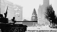 An army tank in the deserted main town square in Timisoara, Romania, on December 24, 1989, opposite the Orthodox Cathedral, where the start of the demonstration began seven days before, when Ceausescu special police killed more than 2,000 people. (AP Photo/Vranic)