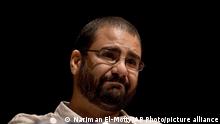 FILE - In this Sept. 22, 2014 photo, Egypt's most prominent activist Alaa Abdel-Fattah speaks at a conference in Cairo, Egypt. In 2015 he was sentenced to five years in prison. A statement Tuesday, April 10, 2018, by Human Rights Watch, a leading international rights group, urged Egypt's President Abdel Fatah el-Sissi to prioritize reforms aimed at ending human rights abuses during his second, four-year term in office. The statement also called on Egypt's allies to push el-Sissi to end a crackdown on non-governmental organizations and enforced disappearances, release political prisoners and journalists and protect minorities. (AP Photo/Nariman El-Mofty, File)