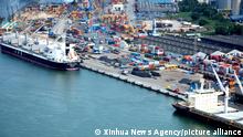 (210101) -- NAIROBI, Jan. 1, 2021 (Xinhua) -- Photo taken on April 9, 2020 shows the Dar es Salaam Port undergoing upgrading of port berths 1 to 7 in Dar es Salaam, Tanzania. (Xinhua)