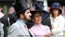 Sheikh Mohammed bin Rashid Al Maktoum court case. File photo dated 11/6/2000 of Sheikh Mohammed Bin Rashid Al Maktoum and HRH Princess Haya Bint Al Hussein at Ascot Racecourse, Berkshire. The ruler of Dubai authorised the hacking of his former wife and her lawyers' phones with multi-million-pound spyware during a legal battle over their two children, the High Court has found. Sheikh Mohammed bin Rashid Al Maktoum, 72, gave his express or implied authority for the phone of his sixth wife Princess Haya Bint Al Hussein, 47, to be infiltrated with Pegasus spyware during the ongoing legal case, the court ruled. Issue date: Wednesday October 6, 2021. See PA story COURTS Sheikh. Photo credit should read: Steve Parsons/PA Wire URN:62908719