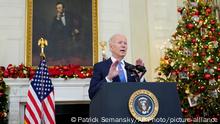 President Joe Biden speaks about the COVID-19 response and vaccinations, Tuesday, Dec. 21, 2021, in the State Dining Room of the White House in Washington. (AP Photo/Patrick Semansky)