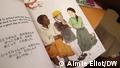 A children's book shows a child with an Asian mother and a Black father