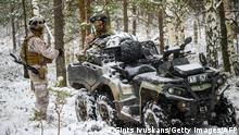 Soldiers take part in the NATO annual military exercise Winter Shield 2021 in Adazi, Latvia, on November 29, 2021. (Photo by Gints Ivuskans / AFP) (Photo by GINTS IVUSKANS/AFP via Getty Images)