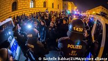 December 22, 2021, Munich, Bavaria, Germany: After cancelling their demo at Theresienwiese, anti-vaxxers, neonazis, Reichsbuerger, Identitaere, Junge Alternative, anti-maskers, Bozkurts (Gray Wolves), and others assembled in the thousands to first intimidate at an anti-conspiracy demo, but then occupied Leopoldstr. and broke through police lines that appeared designed to fail repeatedly as the rebels eventually marched through the city. (Credit Image: Â© Sachelle Babbar/ZUMA Press Wire