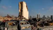 This picture taken on July 14, 2021 shows a partial view of the damaged grain silos at the port of Lebanon's capital Beirut, almost a year after the August 4 massive explosion that killed more than 200 people and injured scores of others. (Photo by PATRICK BAZ / AFP)