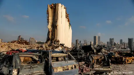 Partial view of the damaged grain silos at the port of Lebanon's capital Beirut, almost a year after the explosion.