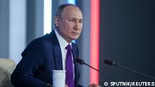 Putin praises Russians for 'hard work' in tough times