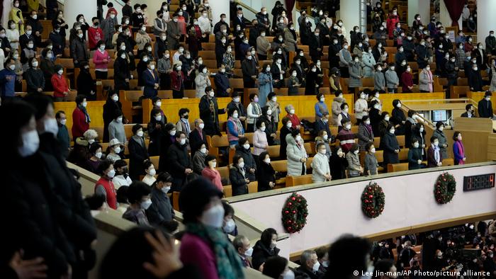 Worshipers wear face masks and maintain social distancing while attending a Christmas service at the Yoido Full Gospel Church in the capital, Seoul.