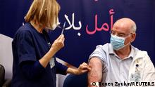 27.12.2021***
Professor Jacov Lavee receives a fourth dose of coronavirus disease (COVID-19) vaccine as part of a trial in Israel, as Health Ministry is considering offering the second booster to the elderly and immuno-compromised at Sheba Medical Center in Ramat Gan, Israel December 27, 2021. REUTERS/Ronen Zvulun