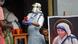 Catholic nuns from the Missionaries of Charity distribute free snacks and tea among the poor, as a young boy peers at a portrait of Mother Teresa Catholic nuns from the Missionaries of Charity distribute free snacks and tea among the poor, as a young boy peers at a portrait of Mother Teresa