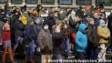 Десятки тысяч человек в Германии протестовали против пандемийных ограничений