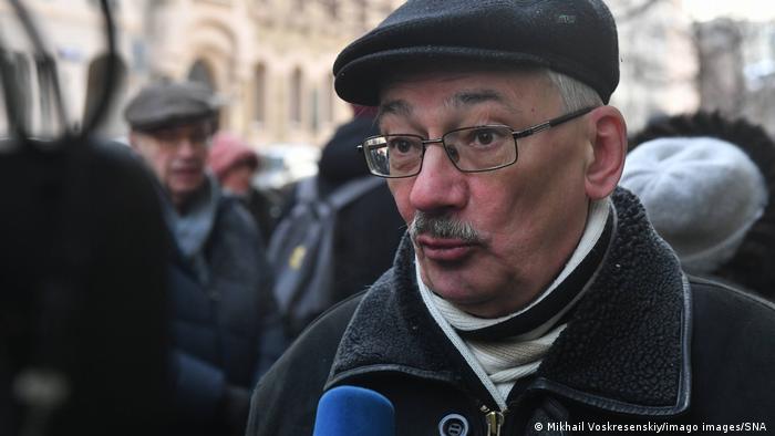 Oleg Orlov, pictured outside a Moscow court, in December