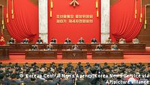 In this photo provided by the North Korean government, North Korean leader Kim Jong Un, center, attends a meeting of the Central Committee of the ruling Workersâ€™ Party in Pyongyang, North Korea on Monday, Dec. 27, 2021. Independent journalists were not given access to cover the event depicted in this image distributed by the North Korean government. The content of this image is as provided and cannot be independently verified. Korean language watermark on image as provided by source reads: KCNA which is the abbreviation for Korean Central News Agency. (Korean Central News Agency/Korea News Service via AP)