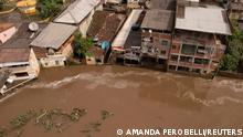 An aerial view shows a flooded street, caused due to heavy rains, in Itajuipe, Bahia state, Brazil December 27, 2021. Picture taken with a drone. REUTERS/Amanda Perobelli
