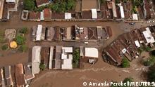 An aerial view shows flooded streets, caused due to heavy rains, in Itajuipe, Bahia state, Brazil December 27, 2021. Picture taken with a drone. REUTERS/Amanda Perobelli
