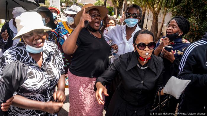 Women sing and dance at a memorial service held for Anglican Archbishop Emeritus Desmond Tutu