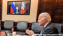 U.S. President Joe Biden holds virtual talks with Russia's President Vladimir Putin amid Western fears that Moscow plans to attack Ukraine, during a secure video call from the Situation Room at the White House in Washington, U.S., December 7, 2021. /The White House/Handout via REUTERS. THIS IMAGE HAS BEEN SUPPLIED BY A THIRD PARTY.