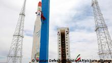 FILE - In this July 27, 2017, file photo, released by the official website of the Iranian Defense Ministry, claims to show the Simorgh satellite-carrying rocket at Imam Khomeini National Space Center in an undisclosed location, Iran. Iran said Sunday, Jan. 19, 2020, that two newly constructed satellites have passed pre-launch tests and will be transported to the nation's space center for eventual launch, without elaborating. (Iranian Defense Ministry via AP, File)