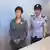 Former South Korean president Park Geun-hye being escorted by a uniformed female guard