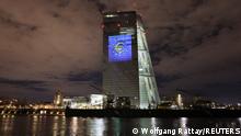 A symphony of light consisting of bars, lines and circles in blue and yellow, the colours of the European Union, illuminates the south facade of the European Central Bank (ECB) headquarters in Frankfurt, Germany, December 30, 2021. REUTERS/Wolfgang Rattay