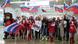 Fans of the Russian world junior hockey team holding Russian flags Fans of the Russian world junior hockey team holding Russian flags