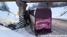 RYAZAN REGION, RUSSIA - JANUARY 2, 2022: The site of a road accident on Route P22 near the village of Voslebovo where a Neoplan bus crashed into a railway bridge pillar. According to preliminary data, 5 people were killed and 21 injured in the accident. Ryazan Region Branch of Russian State Road Safety Inspectorate/TASS