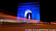 01.01.2022 *** A picture shows the Arc de Triomphe lit up in blue to mark the French presidency of the European in Paris on January 1, 2022. - France took over the rotating presidency of the EU on January 1, 2022. To mark the start of the six-month EU presidency, historic buildings across the country were illuminated in the blue of the EU flag on New Year's Eve, including the Elysee Palace and the Eiffel Tower. (Photo by JULIEN DE ROSA / AFP) (Photo by JULIEN DE ROSA/AFP via Getty Images)