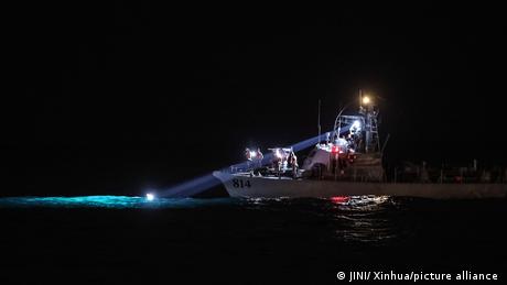 Rescue teams look for wreckage from chopper crash near the coast of Haifa late Monday