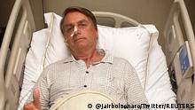 Brazil's President Jair Bolsonaro gestures while being hospitalized due to an intestinal blockage in Sao Paulo, Brazil January 3, 2022 in this picture obtained from social media. @jairbolsonaro via Twitter/via REUTERS THIS IMAGE HAS BEEN SUPPLIED BY A THIRD PARTY. MANDATORY CREDIT. NO RESALES. NO ARCHIVES.