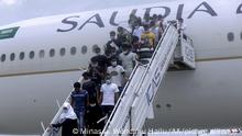In this picture from July 2021 a group of migrants deported from Saudi Arabia arrives back in Ethiopia
