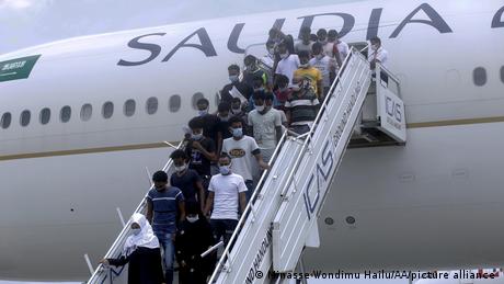 In this picture from July 2021 a group of migrants deported from Saudi Arabia arrives back in Ethiopia